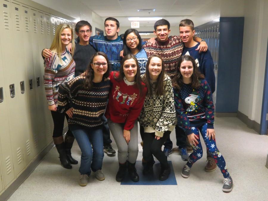 Mills+students+pose+for+a+picture+on+Ugly+Sweater+Day.