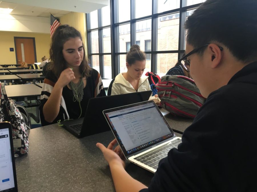 Seniors Erin Gonchar and Isaac Baek work on their VHS BC Calculus class during study hall.
