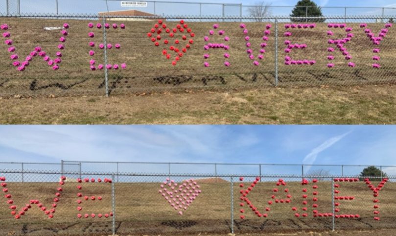 Mills+students+arranged+cups+in+the+fence+facing+the+road+in+honor+of+Kailey+and+Avery.