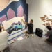 Artists working on The Old Road mural at the Indian Pueblo Cultural Center