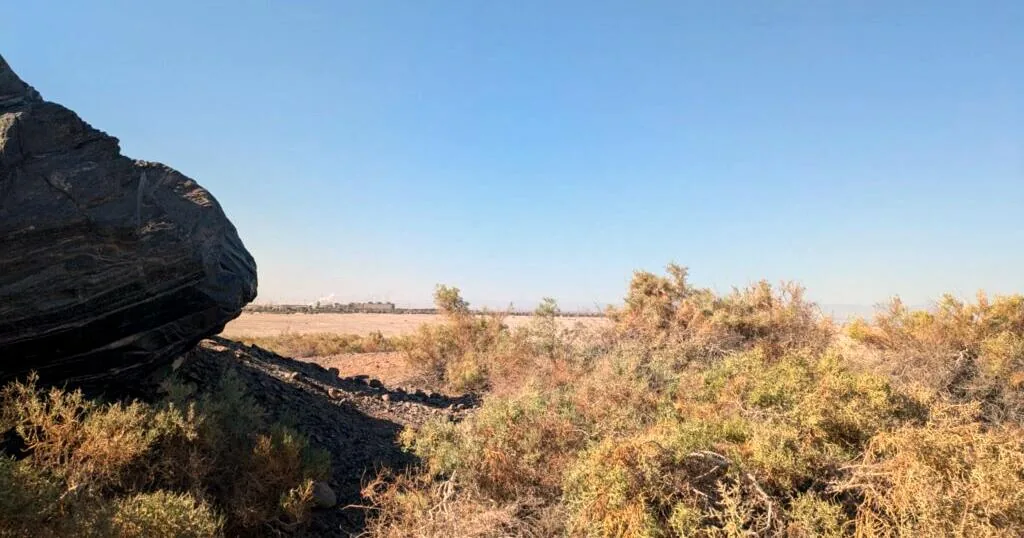 Geothermal steam rises near mud pots along the Salton Sea in the Southeast Lake Cahuilla district