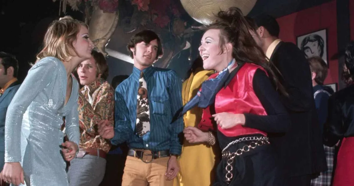 People dancing and listening to live music in an early American nightclub