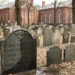 A historic gravestone for Boston in the Granary Burying Ground with a carved winged skull