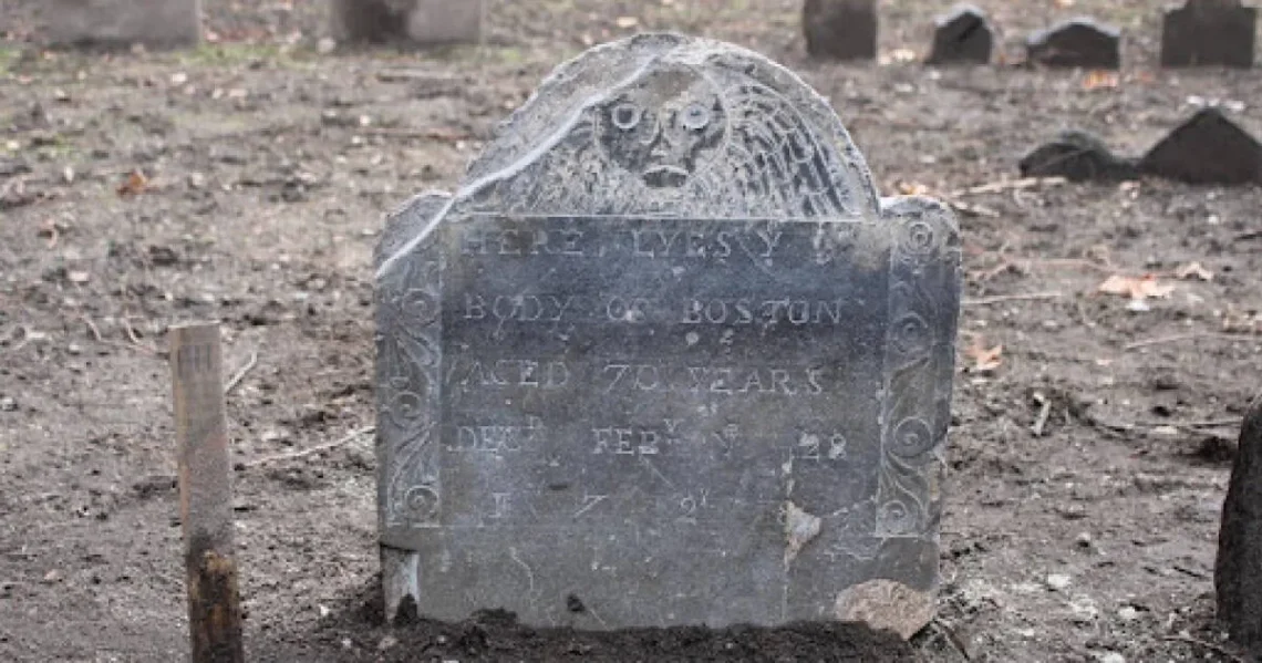 A restored colonial gravestone marked Boston in Granary Burial Ground