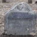 A restored colonial gravestone marked Boston in Granary Burial Ground